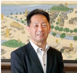 上田健一郎社長の肖像写真